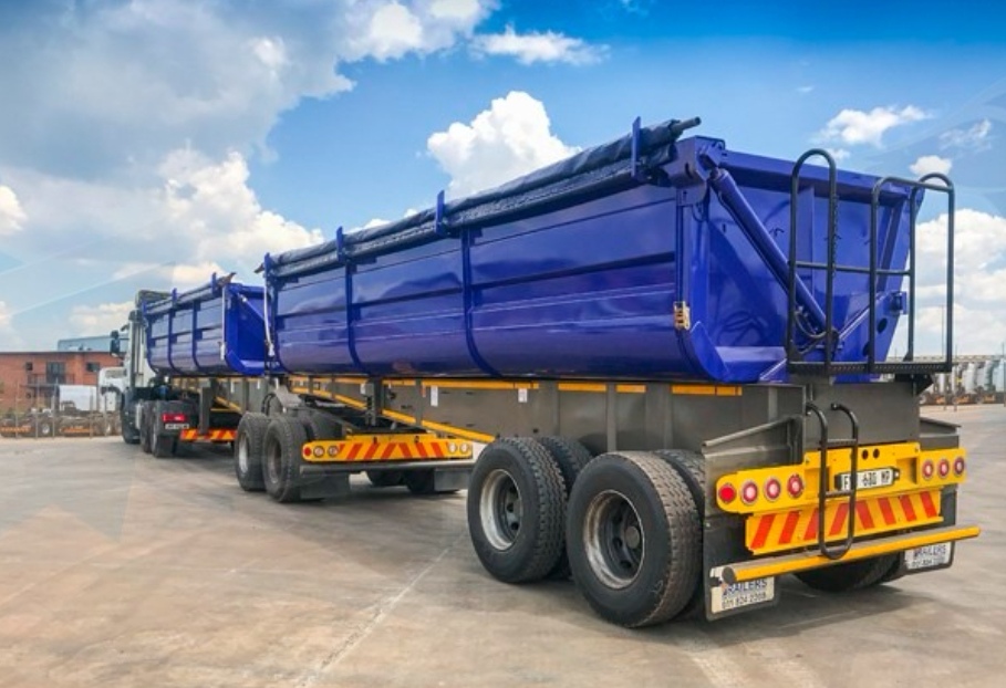 Top trailer sidetipper