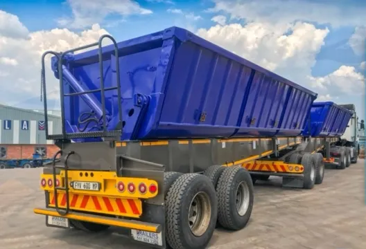 Top trailer sidetipper