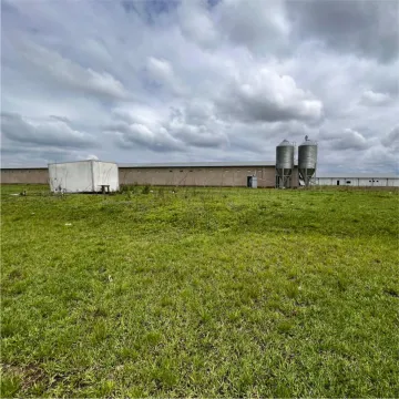 Agricultural farm near Pietermaritzburg with poultry facilities, factory, and residential units.