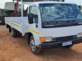 2009 Nissan UD 40 dropside body truck